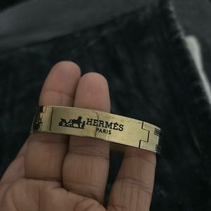 Gold and black bracelet